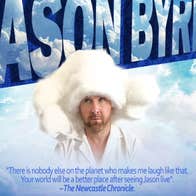 A man looking upwards in white shirt with head covered in huge, white, fluffy hat surrounded by clouds