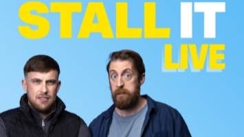 2 men standing, one looking suprised