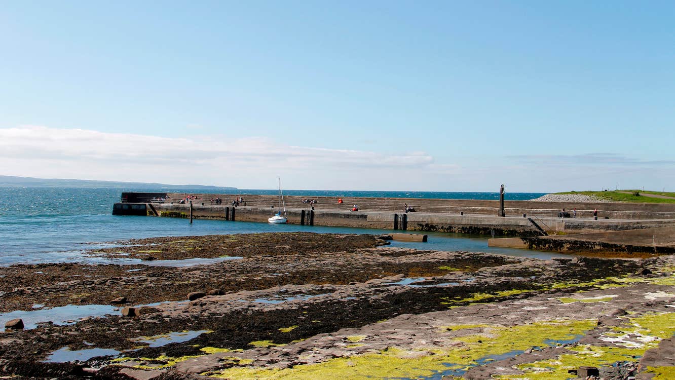 Inishcrone Pier in County Sligo on a sunny day.