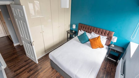 Double bedroom with white sheets