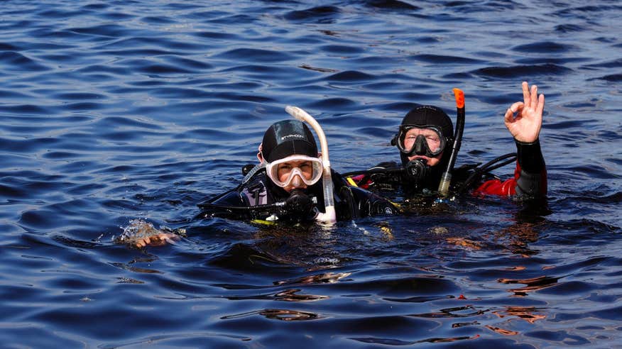 Two people in the water scuba diving at Offshore Watersports in Mullaghmore, Sligo
