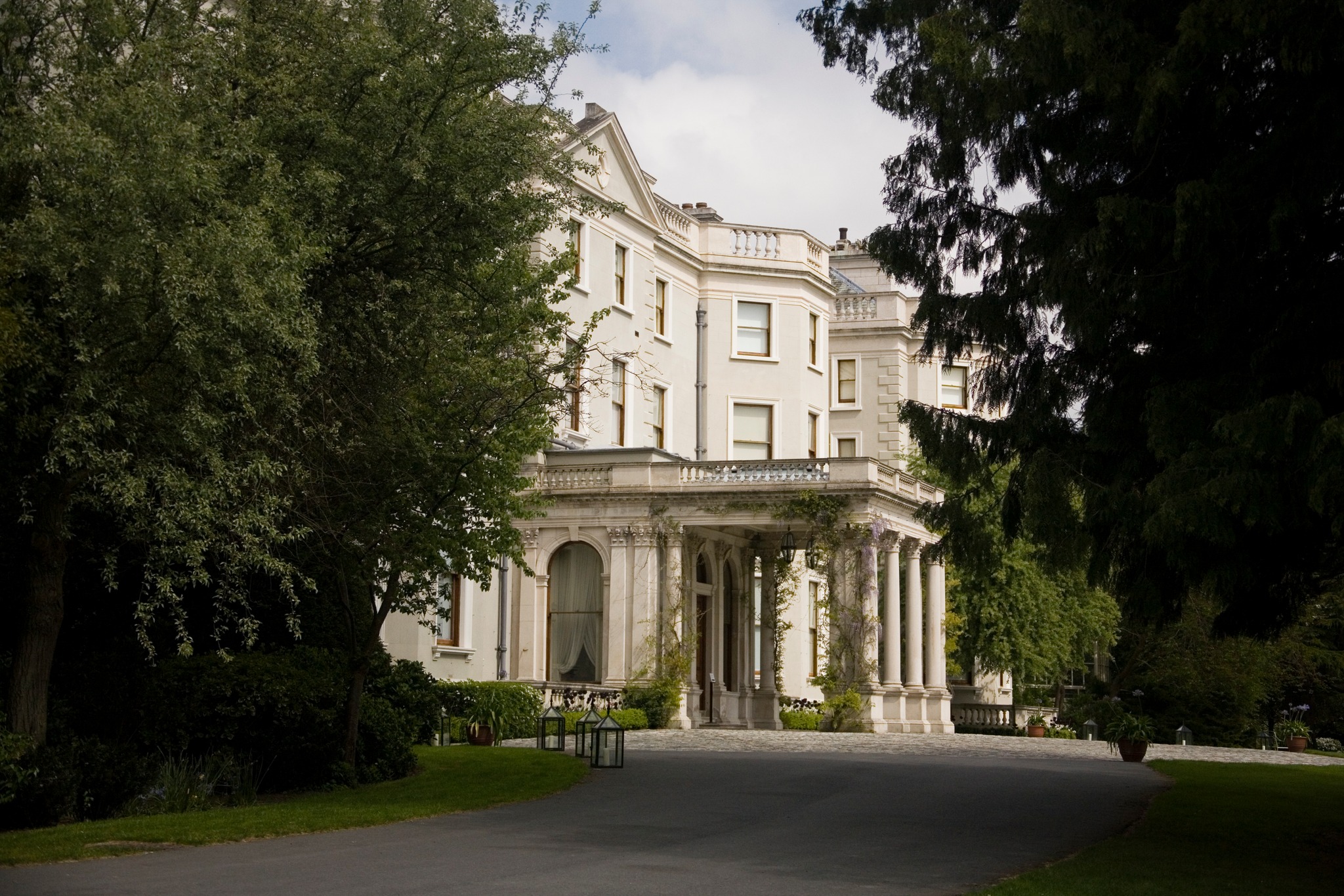 Farmleigh House featuring porte chochere and thuja trees