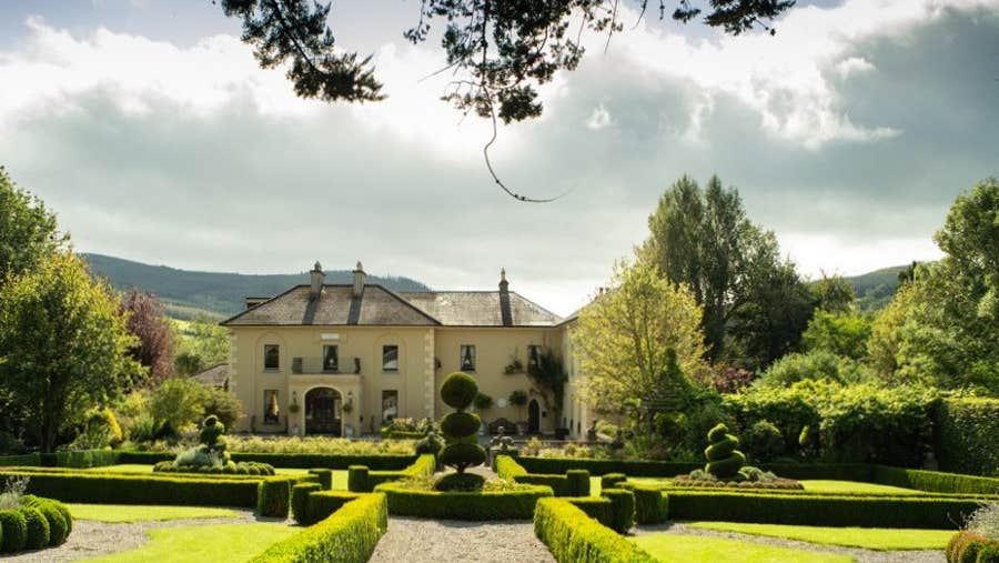 Front view of property and gardens