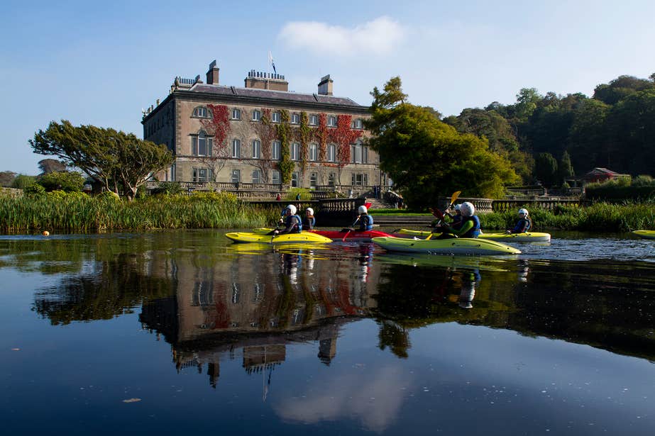 People kayaking on the blueway at Westport House in County Mayo.