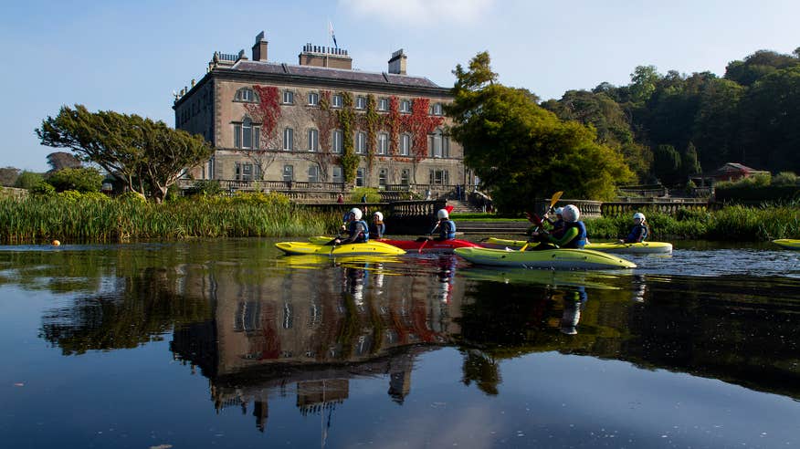 People kayaking on the blueway at Westport House in County Mayo.