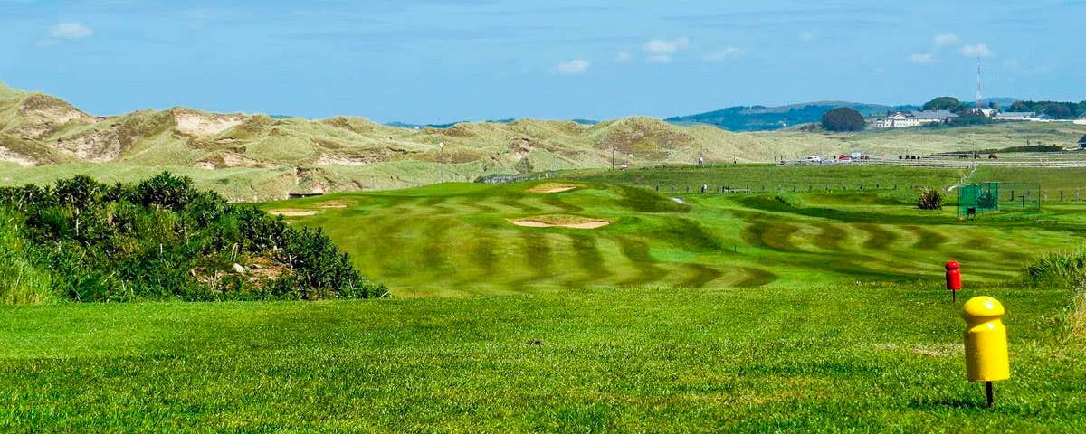 Bundoran Golf Club fairway with sand dunes in background