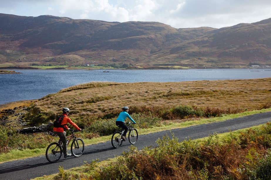 Two people cycling along the Great Western Greenway, Mayo