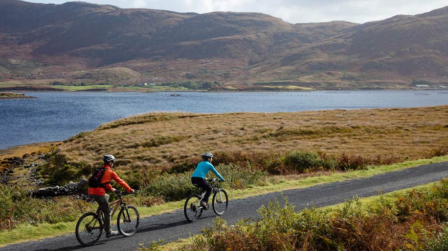 Two people cycling along the Great Western Greenway, Mayo