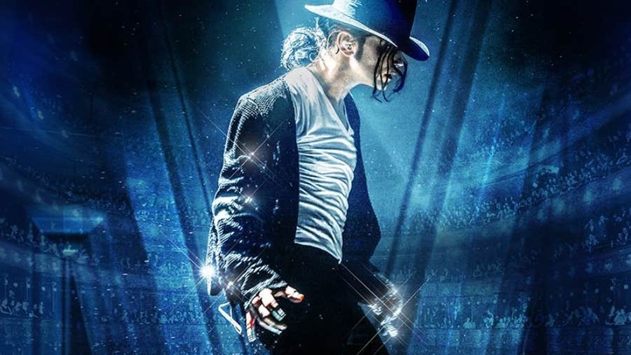 Michael Starring Ben - side view of person dressed like Michael Jackson with shiny jacket and brimmed hat.