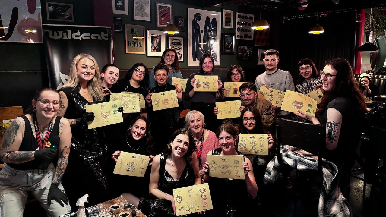 A buzzing group of guests proudly showing off their tattoo “masterpieces” on practice skin. Big smiles, good vibes, and the perfect snapshot of Dublin’s wildest, most creative night out.