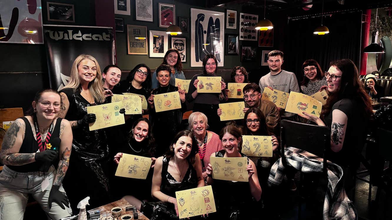 A buzzing group of guests proudly showing off their tattoo “masterpieces” on practice skin. Big smiles, good vibes, and the perfect snapshot of Dublin’s wildest, most creative night out.