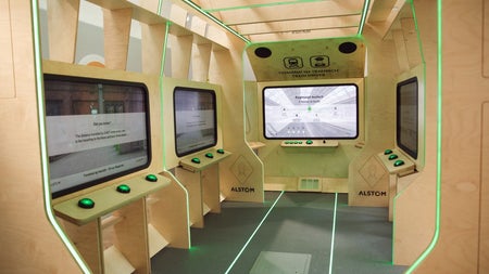 Interior of railway carriage modernised with screens and consoles