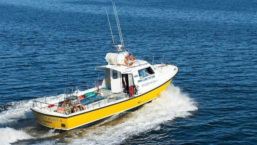 Boat cruising on open water.