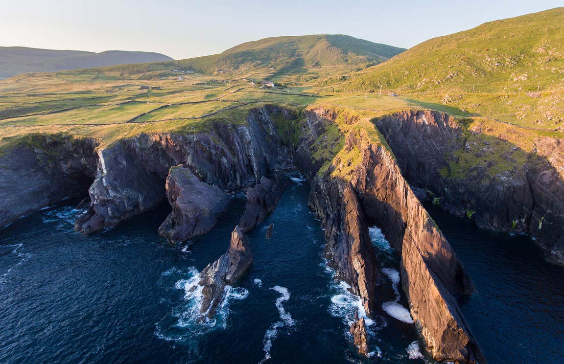 Green fields and cliffs at Skellig Ring, Co. Kerry