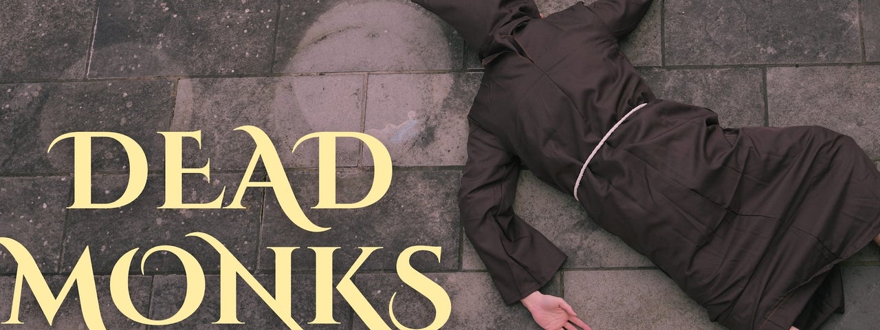 A person in brown monk's dress lying face down on stone floor