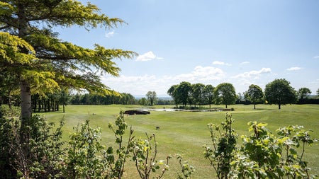 A view of a lake on a golf course