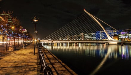 The harp shaped Samuel Beckett Bridge in Dublin City pictured when it is illuminated at night