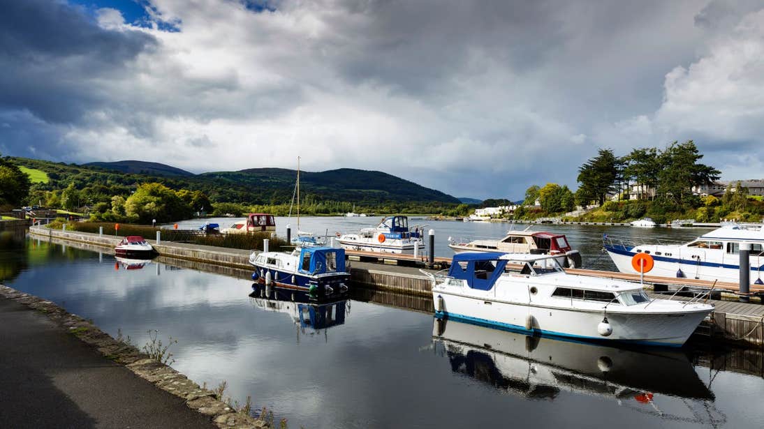 A cloudy blue sky and boats at Killaloe Harbour on the River Shannon