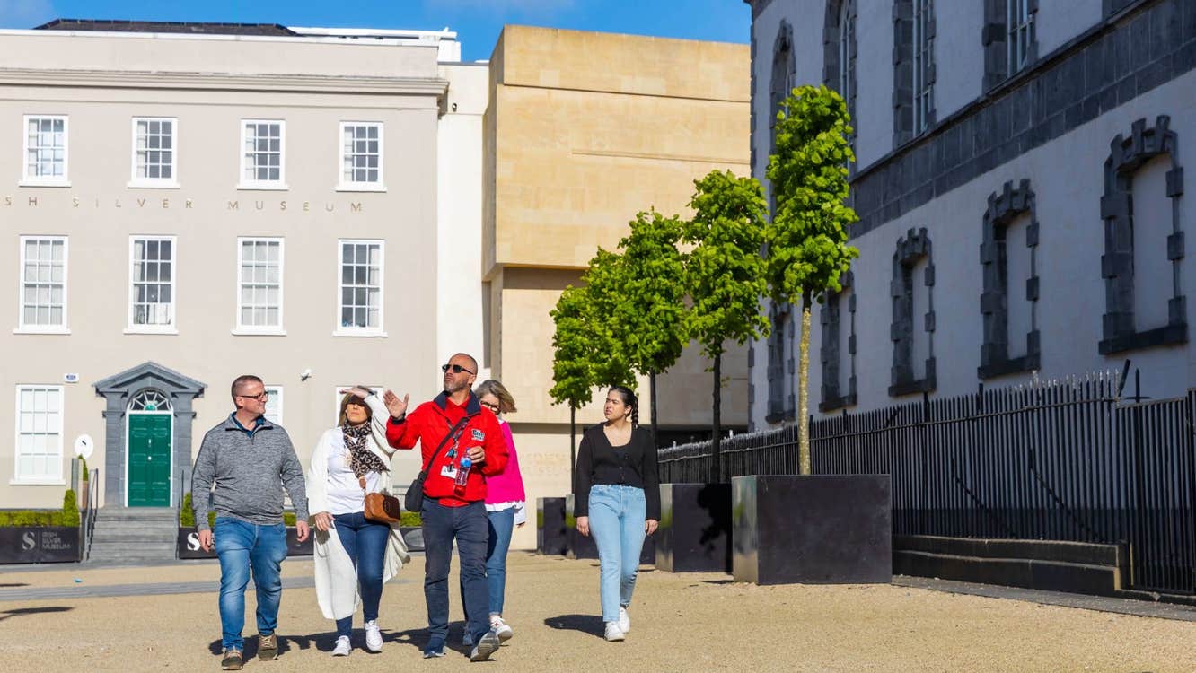 A group and guide on an Epic Walking Tour of the Viking Triangle