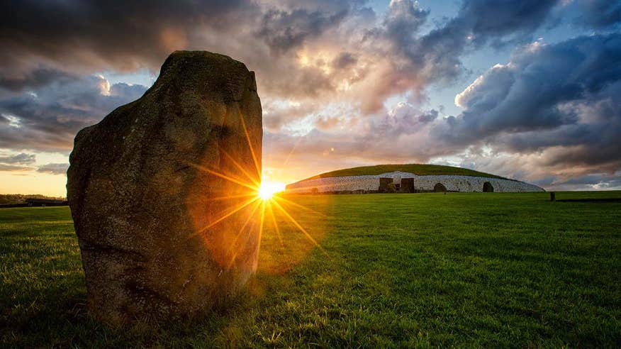 Sunset behind Newgrange in County Meath