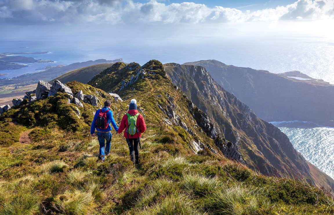 Two people hiking on the Slieve League Cliffs, Donegal