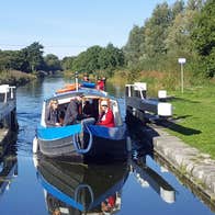 Am image of the barge passing through the lock gates on the canal