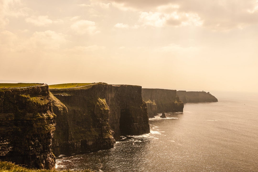 A side view of cliffs stretching into the distance