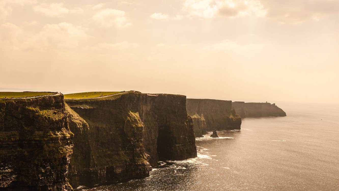 A side view of cliffs stretching into the distance