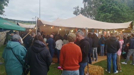 Shot of packed festival tent at Bowden concert