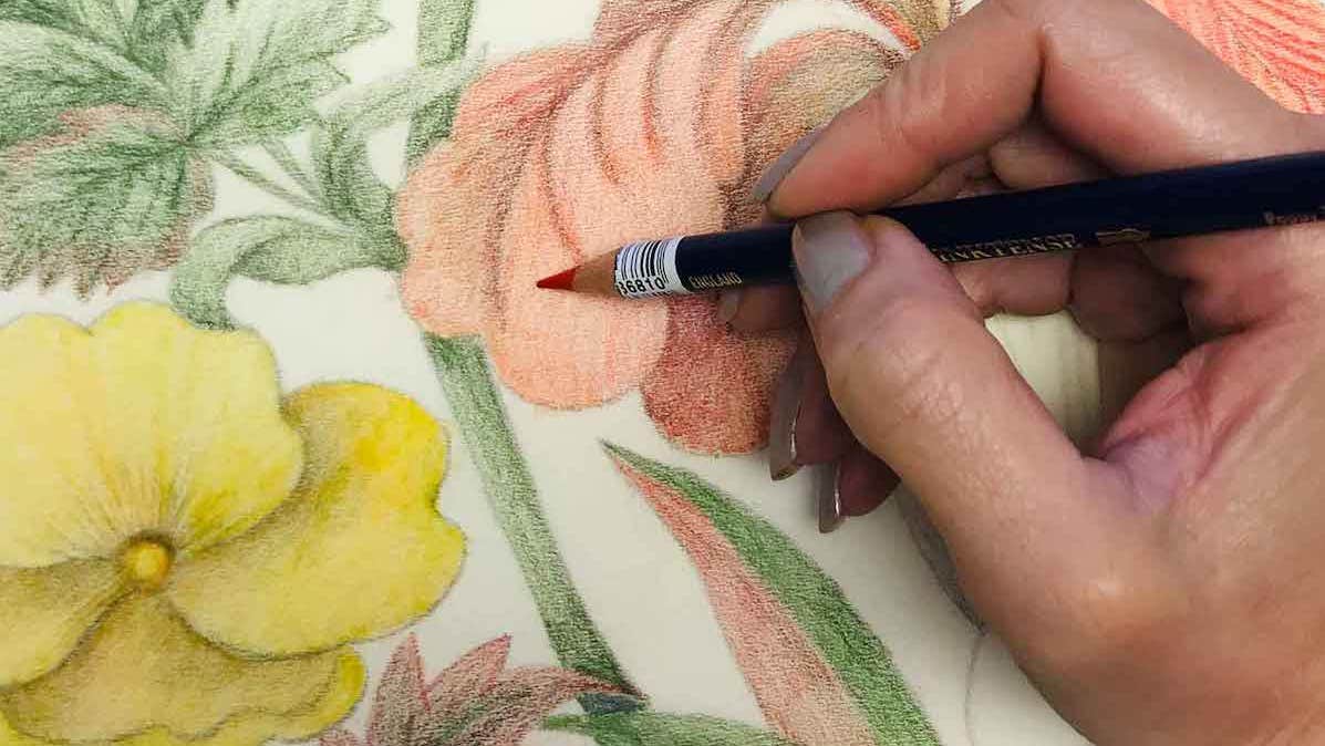 Drop-in Drawing with Roxana Manouchehri, close up view of a hand holding pencil colouring hand drawn flowers in pale pink, yellow and green stems and leaves.