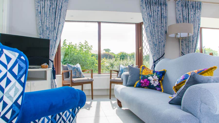 Sitting room with blue chairs