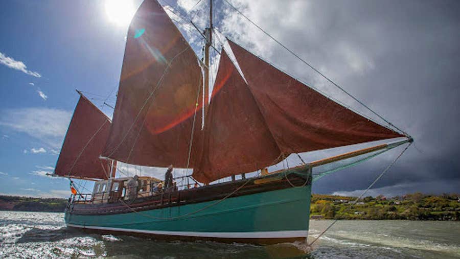 Dublin Under Sail view of traditional sail boat from the side