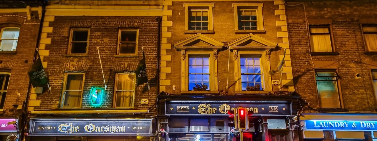 The exterior of The Oarsman pub at night