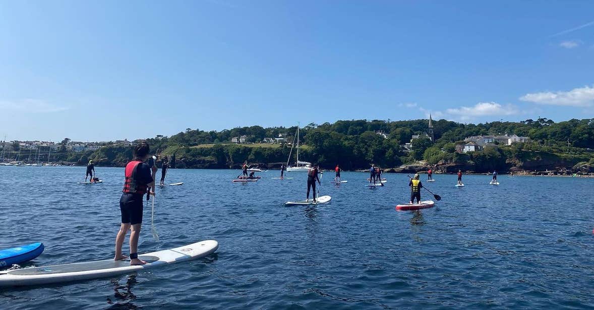 People SUP-ing in Dunmore East in County Waterford.