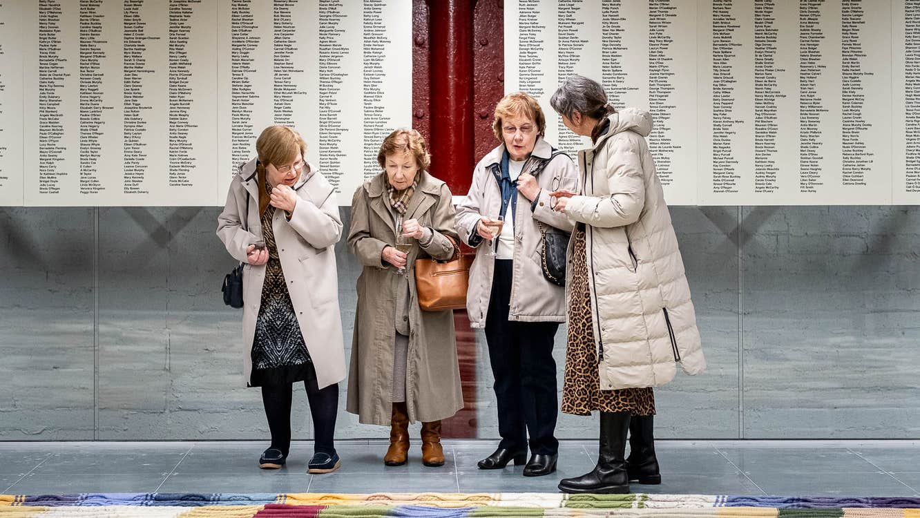 Knitters from The Knitting Map in 2005 visiting the Exhibition. The Knitting Map is an abstract map of Cork City over a calendar year combining weather data to generate colour, and the business of the city to generate complexity of stitch.