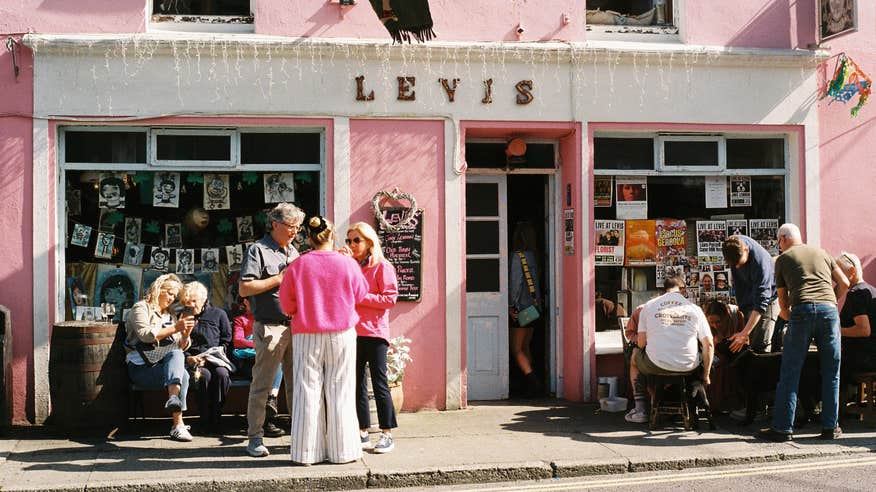 People gathered outside at Levis' Corner House in Ballydehob, County Cork.