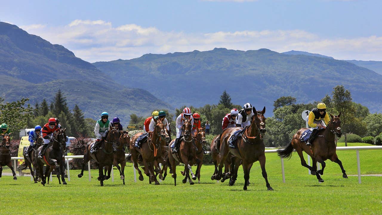 Jockeys racing during a summer racing festival at the Killarney Racecourse