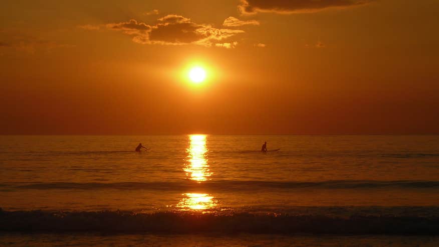 Surfers at Strandhill Beach, Co Sligo at sunset