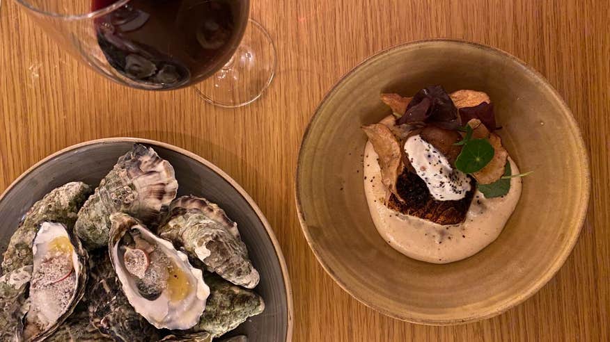 Oysters, seafood and red wine on a table in Donegal