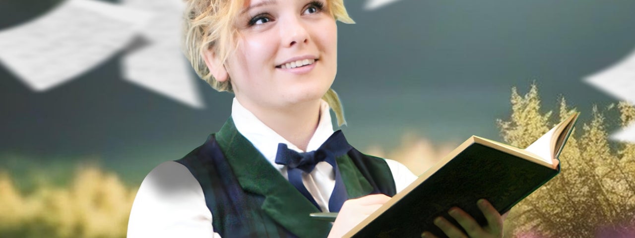 A woman in white shirt and dark waistcoat and bow tie is holding a open book and pen, looking slightly upwards, smiling.