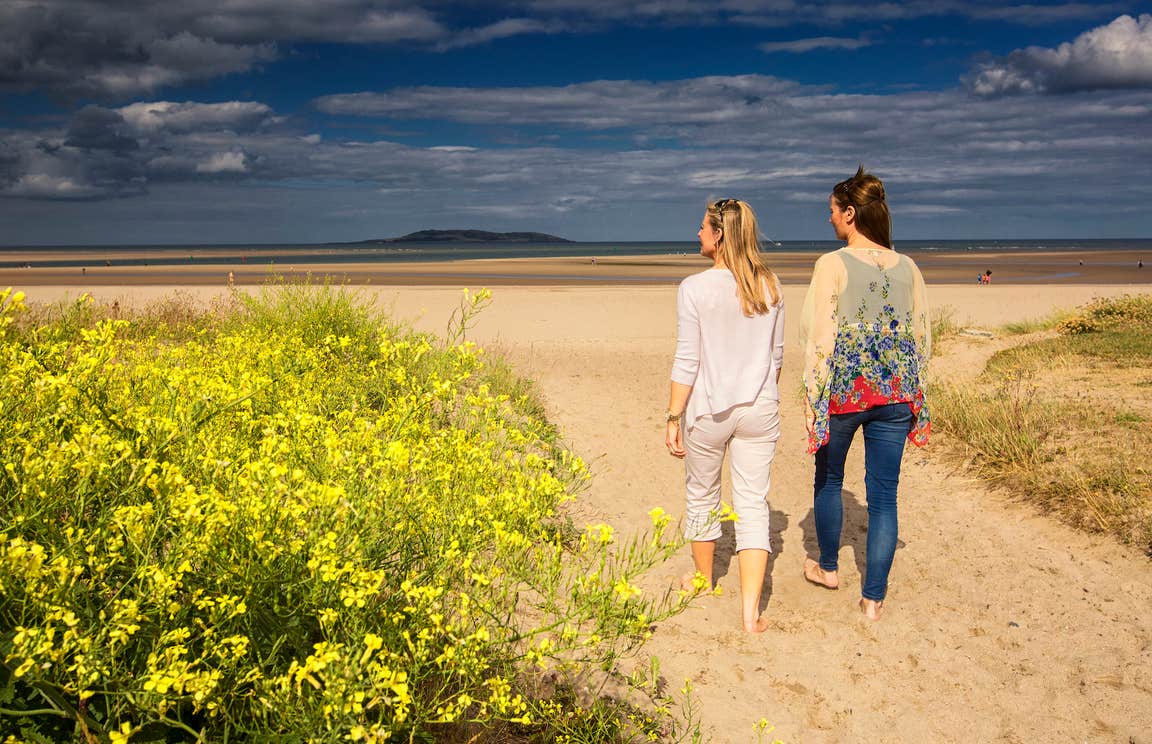Two women on Malahide Beach in County Dublin