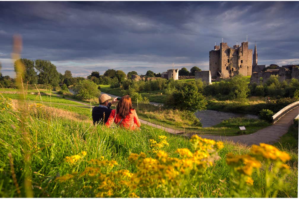 A couple looking at Trim Castle