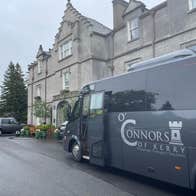 O'Connors of Kerry bus outside a of victorian country home