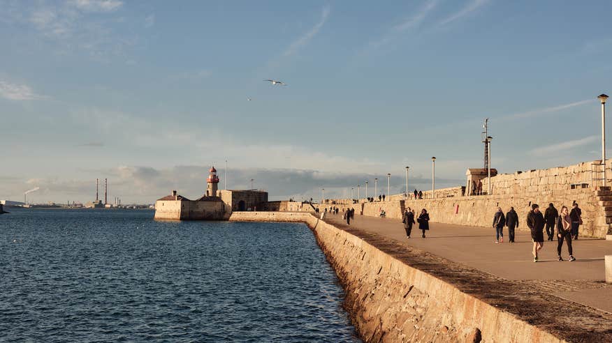 People walking along Dún Laoghaire Harbour in Co Dublin