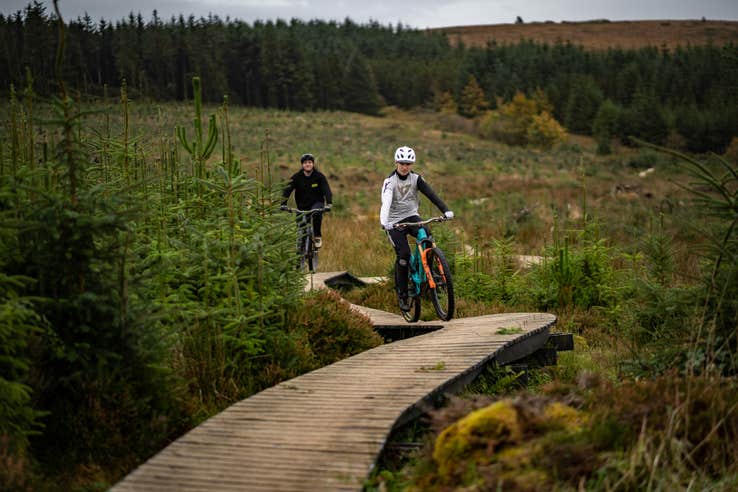 Two people cycling the Ballyhoura Mountain Bike Trails in Limerick.