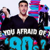 Rob Anderson: Are You Afraid of the 90s? A questioning man holding tape from old video cassettes with piles of tape boxes behind him in 3 different colours.