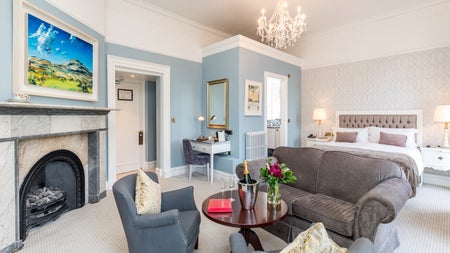 Bedroom with bed and seating area