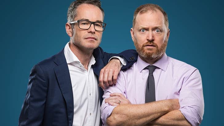 W*nkernomics, Just Touching Base - 2 men in work shirts, one looking shocked.