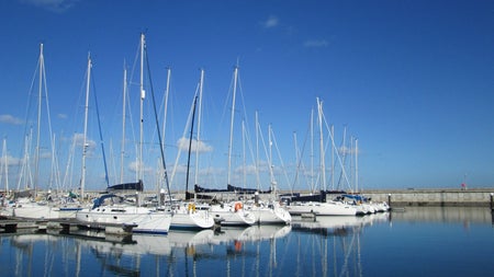 Berthed yachts at the marina.