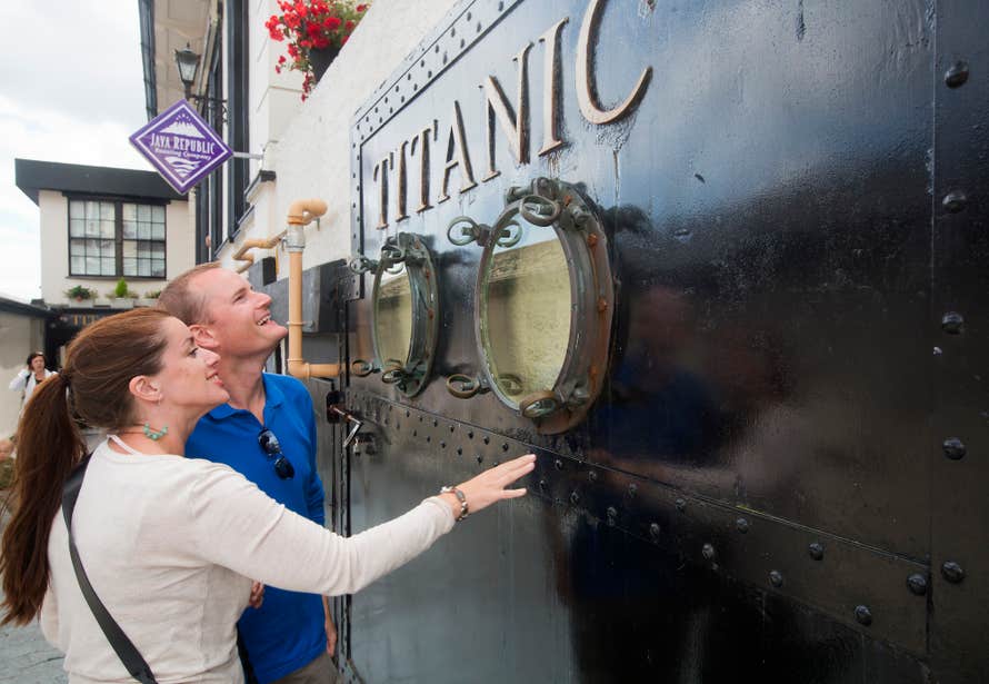 Two people looking at the exhibits at the Titanic Experience in Cobh, County Cork